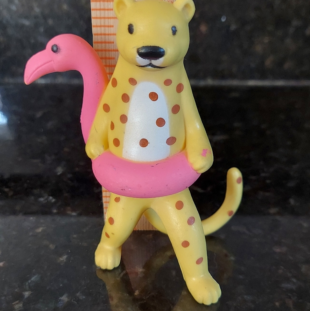Yellow Cheetah Figurine with Pink Flamingo Float